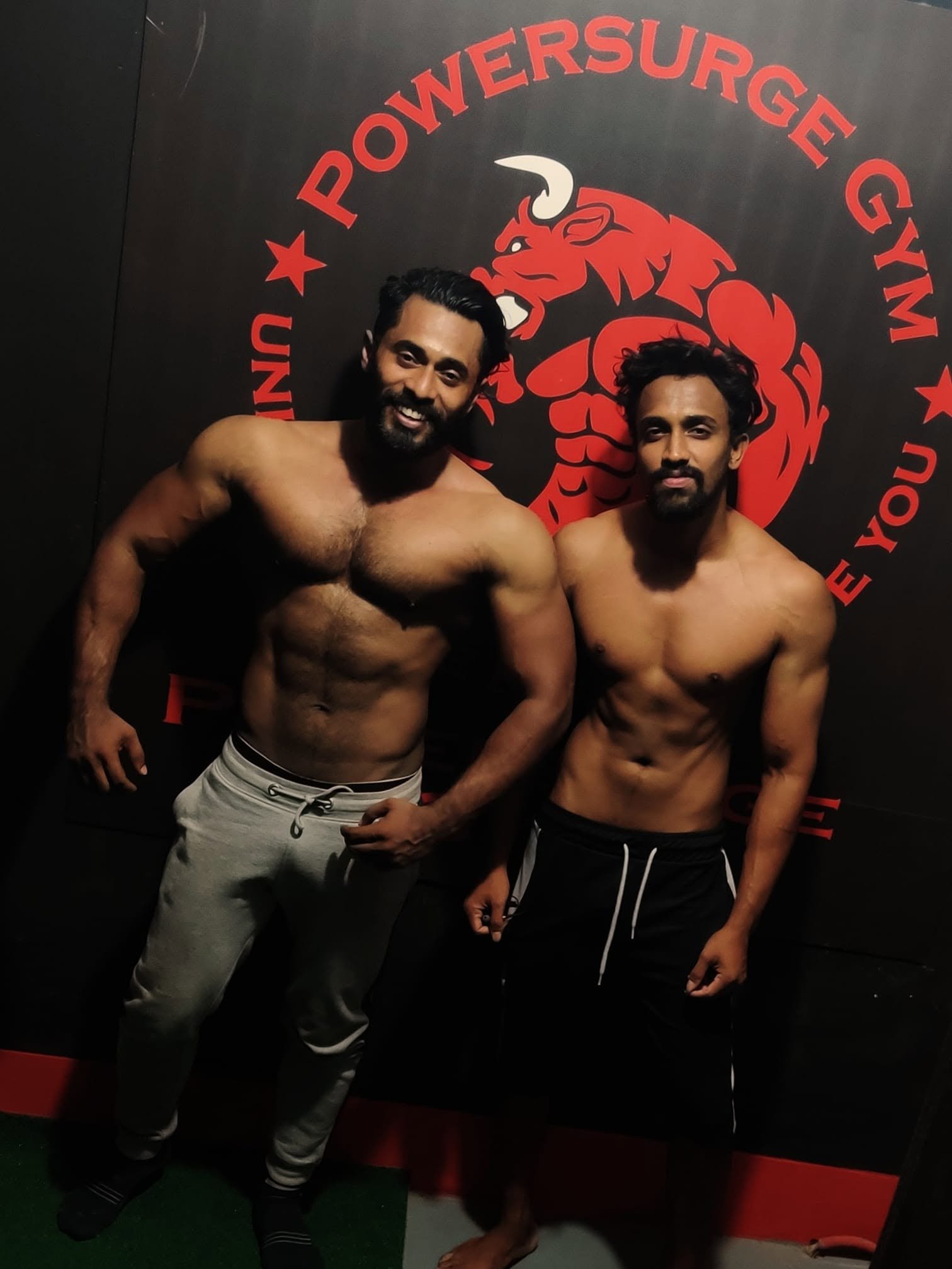 Members Posing With the Legacy Wall
